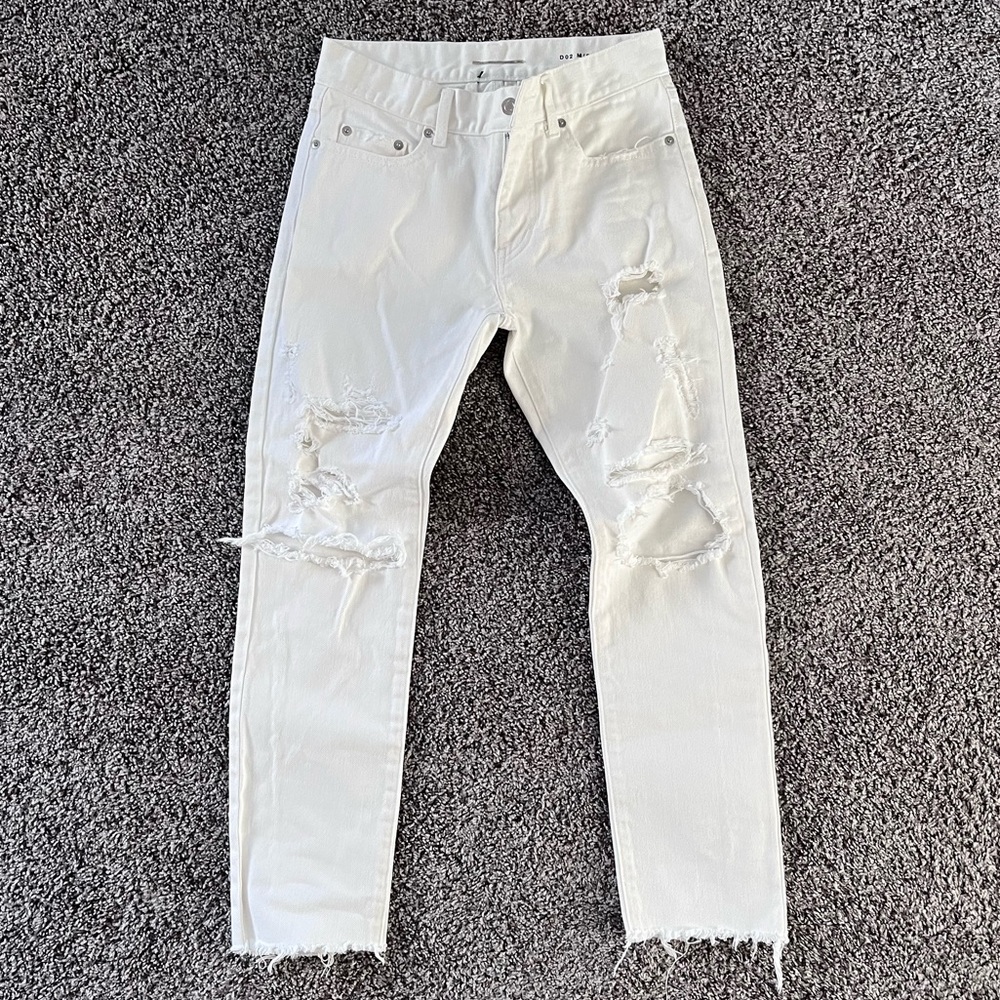 Saint Laurent Distressed denim in white size 28